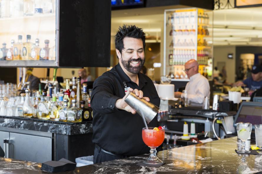 Cadillac Punch (Cadillac Mexican Kitchen & Tequila Bar/Bush Airport): The house specialty features Captain Morgan Spiced Rum, banana liqueur, peach schnapps and more. Located near Gate 17 in Terminal A, Cadillac Mexican Kitchen & Tequila Bar offers a lively mixture of tradition and Mexican flair — not to mention the Barrel-Aged Margarita made with Cruz Del Sol Añejo Tequila. Holiday Cocktails at Houston Airports