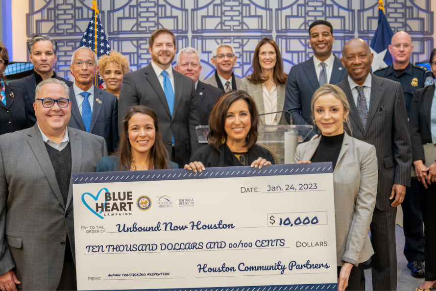 Houston Airports presents check to advocacy group fighting human trafficking
