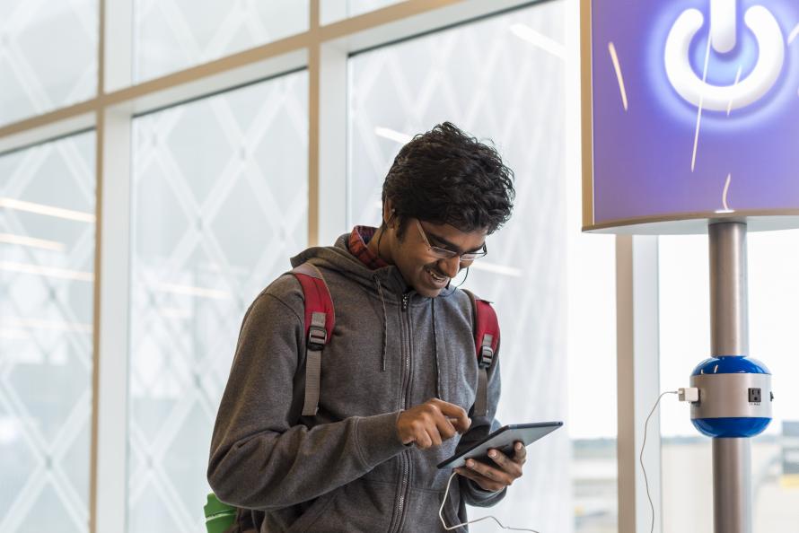 Get plugged in: Technology at Houston Airports help make summer travel a breeze