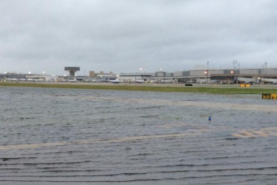Photo of a closed taxiway at George Bush Intercontinental Airport because of flooding during Hurricane Harvey.