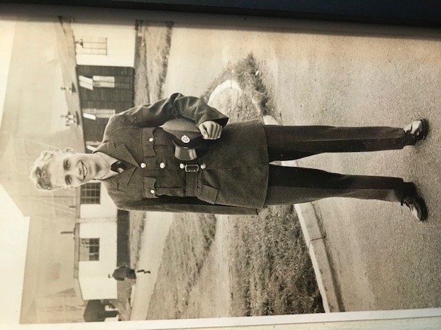 Paul Barker smiles for a photo while serving in the Royal Navy 