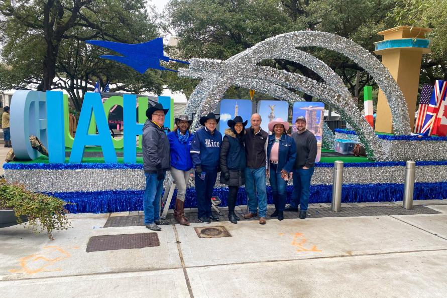 Houston Airports staff pose in front of their popular rodeo float