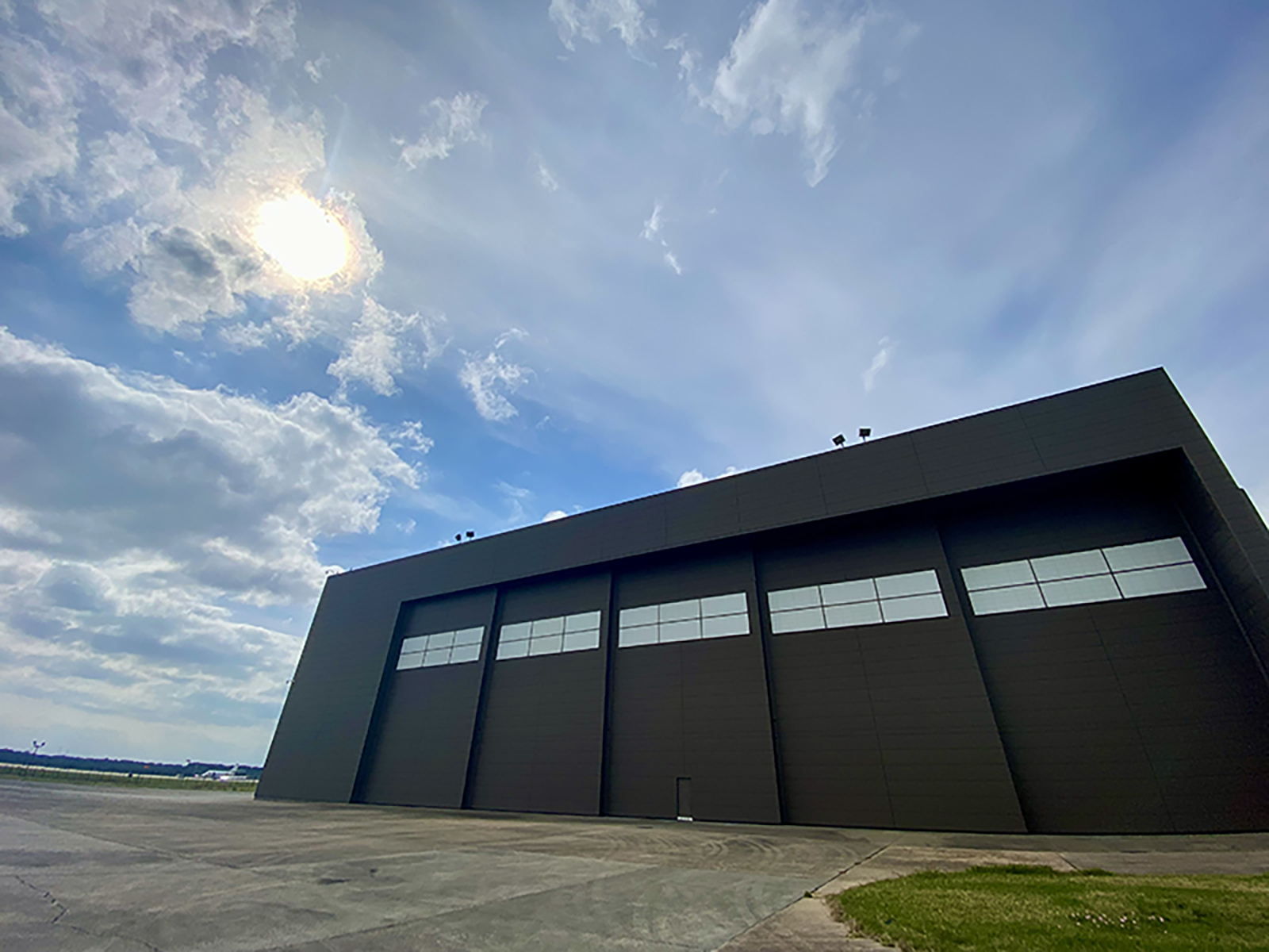 The maintenance complex includes two aircraft bays and ramp space for up to four aircraft, as well as warehouse, shops, and office space.