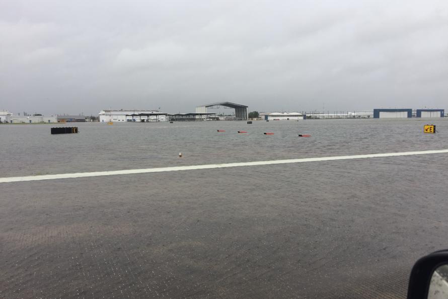 Photo of a flooded airfield at Ellington Airport on August 27, 2017 after Hurricane Harvey made landfall 