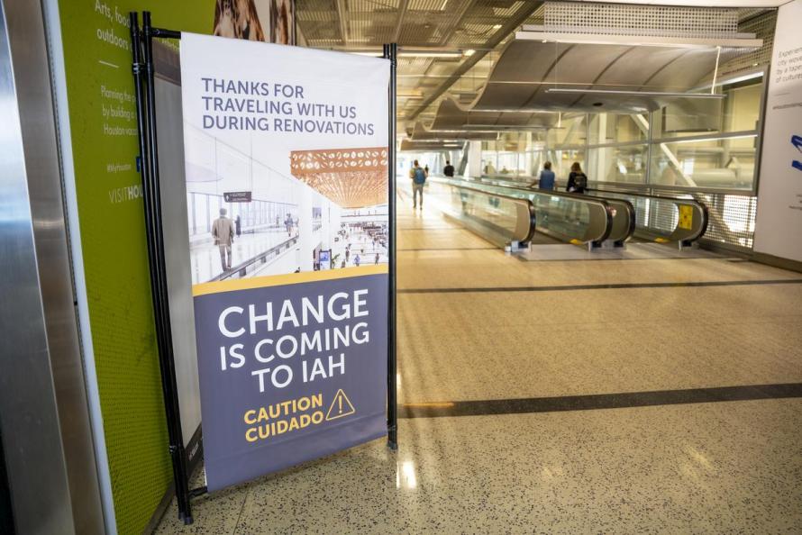 Billboard positioned inside Bush Airport alerts travelers to construction in international terminal: Change is Coming to IAH
