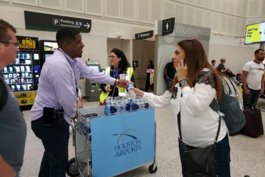 handing out water